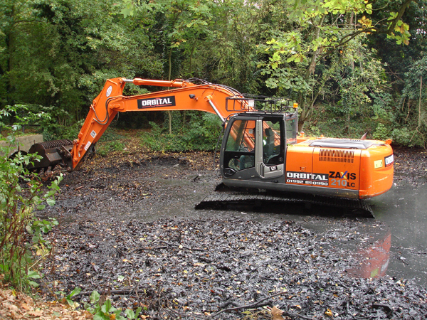 We use heavy machinery where necessary to remove silt and sludge for disposal.